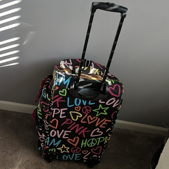 pink rolling duffle bag